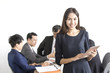 © Jestercine - Beautiful asian business woman using tablet with leader concept and a group of person, 20-30 year old.