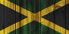 Jamaica Flag Painted On Wooden Wall For Background