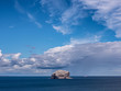 The Bass Rock island in the Firth of Forth in the east of Scotland. This tiny rock at summertime is home of to a largest colony of gannets on earth.