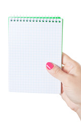 Fototapete - Woman Hand Holding Blank Spiral Notepad.