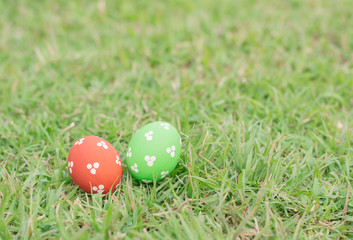 Colorful easter eggs on green grass