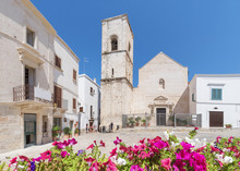 Central Square And Matriarchal Church (Chiesa Matrice) In Polignano A Mare, Apulia, Italy