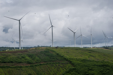  Wind turbine generator farm on storm day 