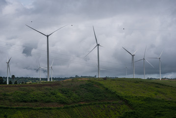  Wind turbine generator farm on storm day 
