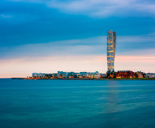 Skyline Of Malmo Sweden With Famous Turning Torso Building, Captured Around Sunset