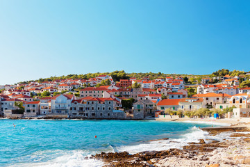 Wall Mural - Cozy beach in a small town Postira on Brac island - Croatia