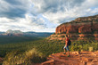 Travel in Sedona, man Hiker with backpack enjoying view, USA