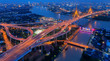 Top view over the highway,expressway and motorway at night, Aerial view interchange of a city, Shot from drone,Expressway is an important infrastructure in Thailand