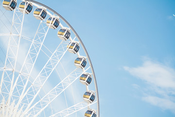 Ferris wheel with beauty blue sky.