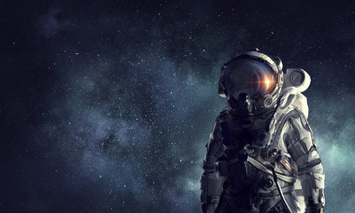 Wall Mural - astronaut explorer in space. mixed media