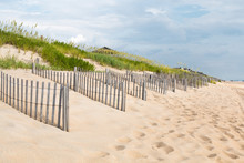 Rows Of Sand Fences Line The Beach In Nags Head, North Carolina On The Outer Banks.