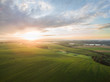 © Riko Best - aerial view of a beautiful sunset over green  corn fields - agricultural fields