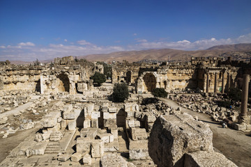 Wall Mural - Entrance of ruins of Jupiter temple and great court of Heliopolis with mountains in the background in Baalbek, Bekaa valley Lebanon