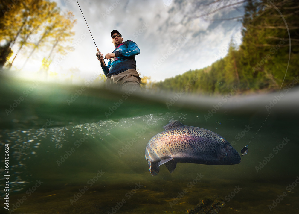 Fishing. Fisherman and trout, underwater view - obrazy, fototapety, plakaty 
