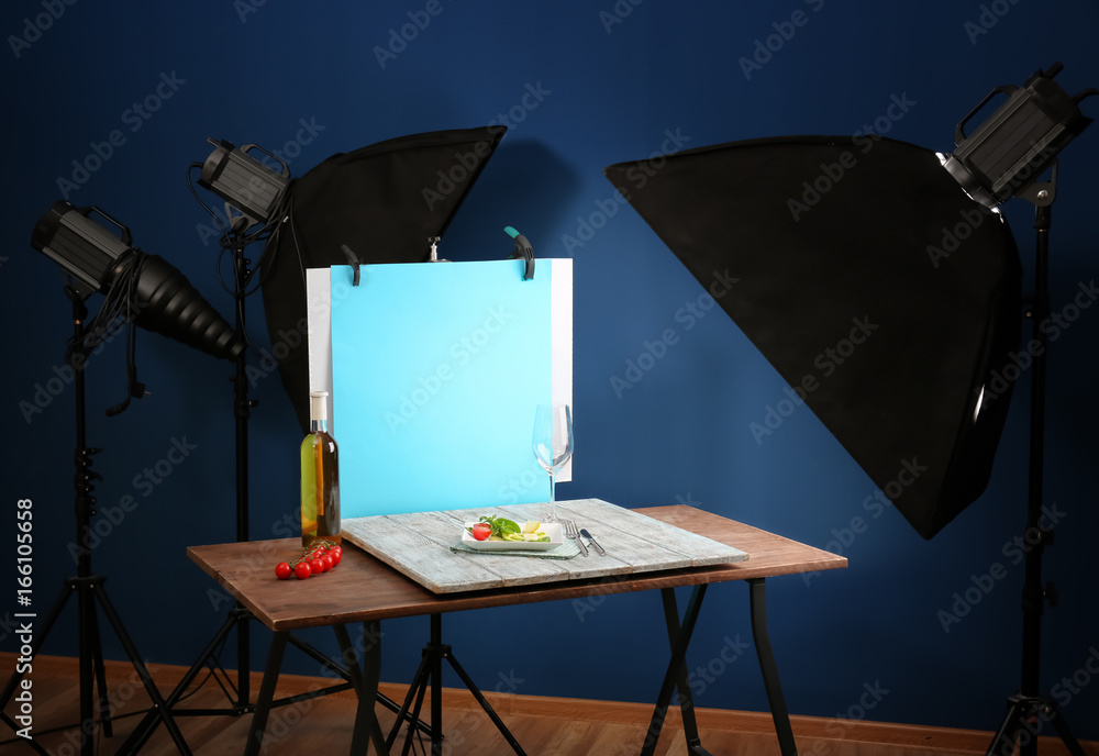 Photo studio with professional lighting equipment during shooting food
