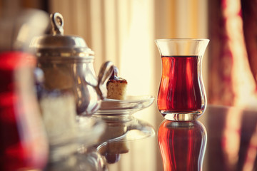 Poster - Turkish tea in traditional glass on table