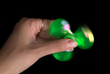 Green Spinner On A Black Background