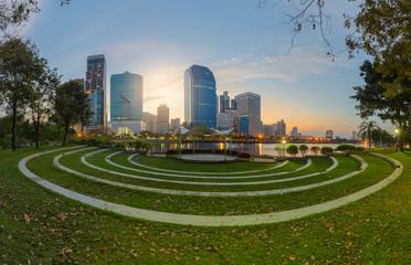 high modern building city nearby the park in central city at morning .