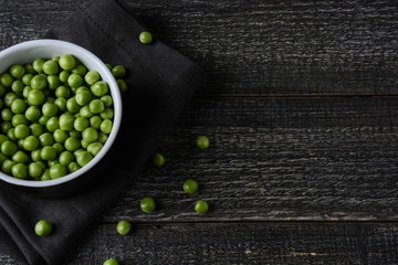 Peas. Fresh bio homemade peas and pods on old oak board. Healthy fresh green vegetable - peas and pods.