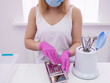 Beautician disinfect professional tools. Disinfection in manicure. Salon care for beauty and health.