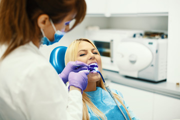 Wall Mural - Woman in Dentist Office