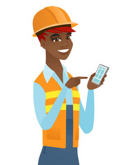 Sticker - Young african builder holding a mobile phone.