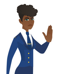 Sticker - Young african stewardess showing stop hand gesture