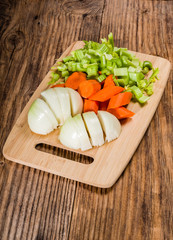 Wall Mural - Vegetable mirepoix on a cutting board