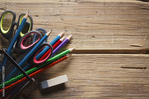 Download Black pencil cup filled with colorful pencils, and ...