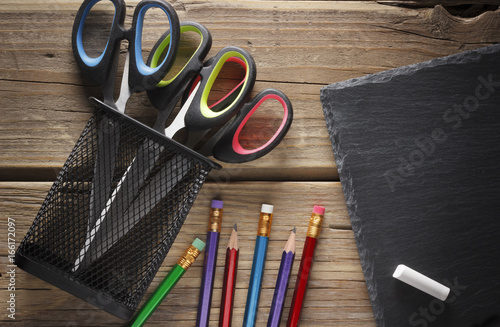 Download Black pencil cup filled with colorful pencils, and ...