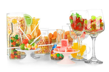 Sticker - Glassware with colorful candies on white background