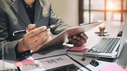 Fotografía Audit concept,Bookkeeper or financial inspector and secretary making report Financial Planning Report in Spreadsheet