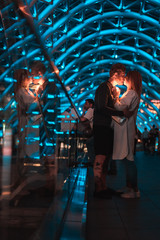 Loving couple on the bridge of Peace