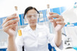 © zinkevych - Test tubes being filled with chemical reagents