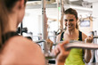 © seanlockephotography - Workspace: Smiling Woman Works Out In Office Fitness Center