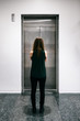 © seanlockephotography - Workspace: Anonymous Woman Waits For Elevator