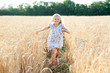 © Rakursstudio - Little beautiful girl running across the field