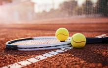 Tennis Ball With Racket On The Tennis Court. Sport, Recreation Concept