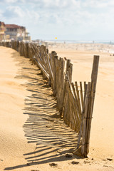  Wooden fence on Atlantic beach in France
