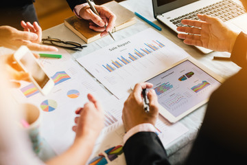 Three businessman investment consultant analyzing company financial report balance sheet statement working with documents graphs. Concept picture for stock market, office, tax,and project.