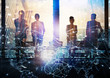 © alphaspirit - Group of business partner looking for the future with network digital effect