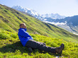© lkoimages - Happy hiker enjoy beautiful mountains. Relax summer time