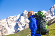 © lkoimages - Happy hiker enjoy beautiful mountains. Relax summer time