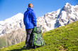 © lkoimages - Happy hiker enjoy beautiful mountains. Relax summer time
