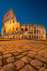 Colosseum at sunset, Rome. Rome best known architecture and landmark. Rome Colosseum is one of the main attractions of Rome and Italy