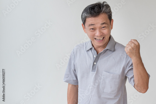 Exited Confident Happy Old Senior Or Middle Age Asian Man Aged