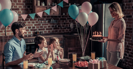 Wall Mural - Family celebrating birthday