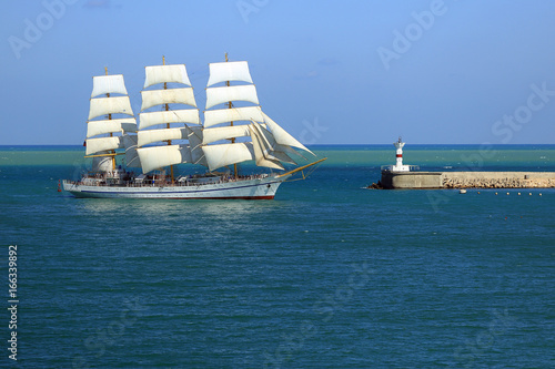 old sailboat enters the port © komi$ar