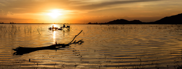 Wall Mural - Lake in the evening with sunset sky.