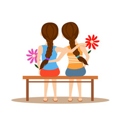back view of two cute girls hugging together on white isolated. happy friendship day